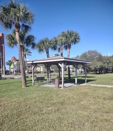 surrounding community featuring a lawn and a gazebo
