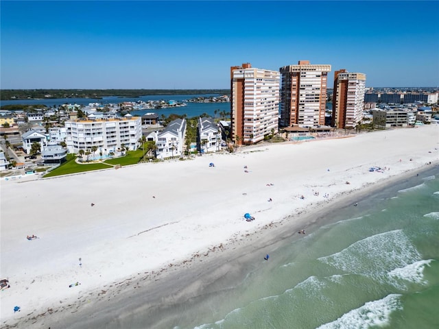 aerial view with a beach view and a water view