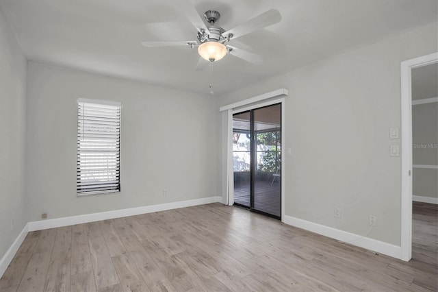 unfurnished room with ceiling fan and light wood-type flooring