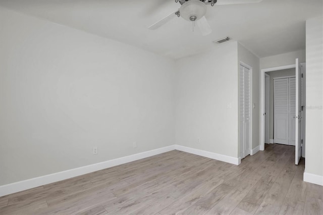 unfurnished bedroom featuring ceiling fan and light hardwood / wood-style floors