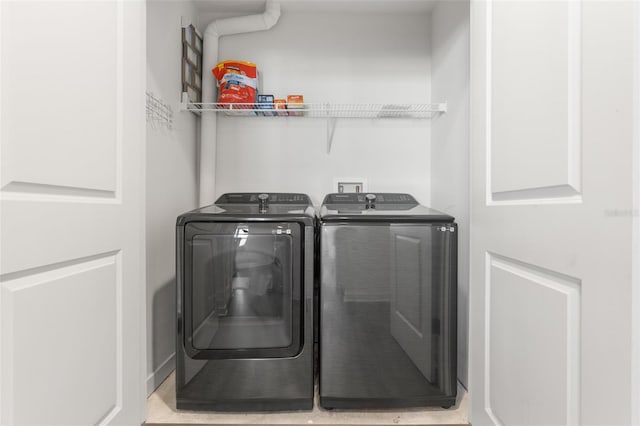 laundry area featuring washer and clothes dryer