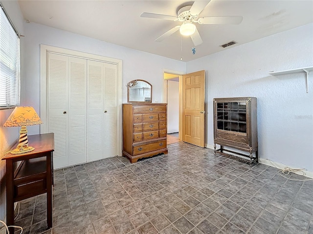 bedroom featuring a closet and ceiling fan