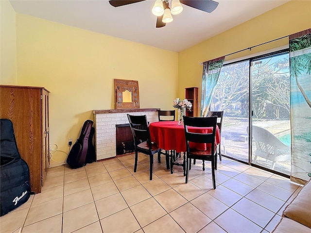 dining area featuring light tile patterned flooring and ceiling fan