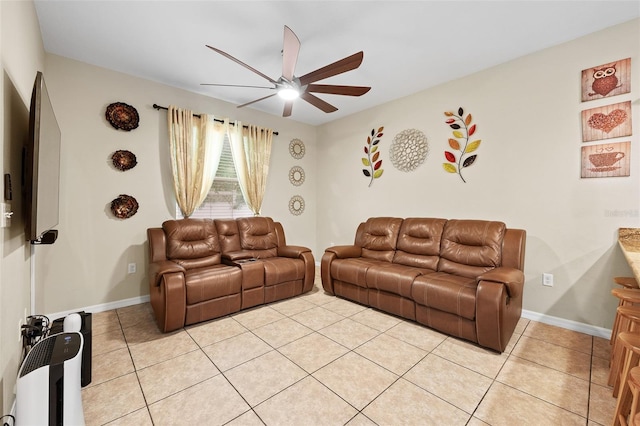 living room featuring light tile patterned floors and ceiling fan