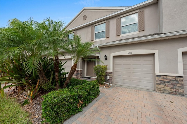 view of front of property with a garage