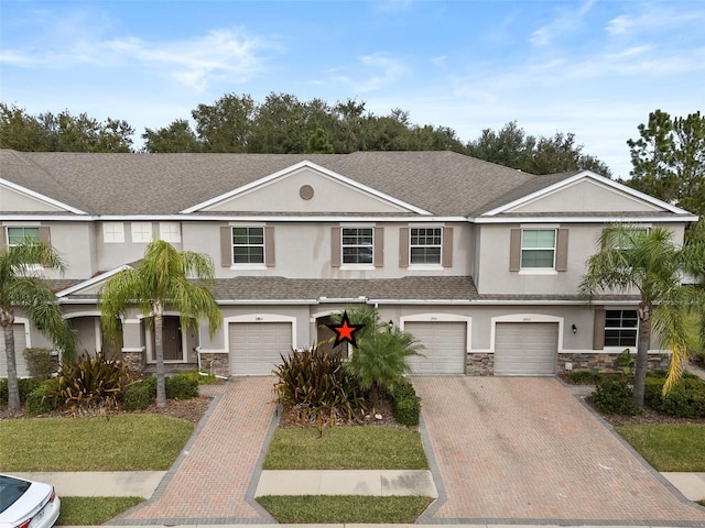 view of front of property featuring a garage