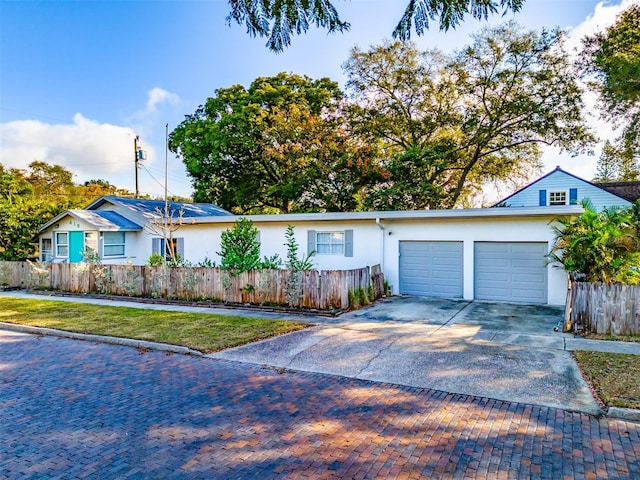 view of front of home with a garage