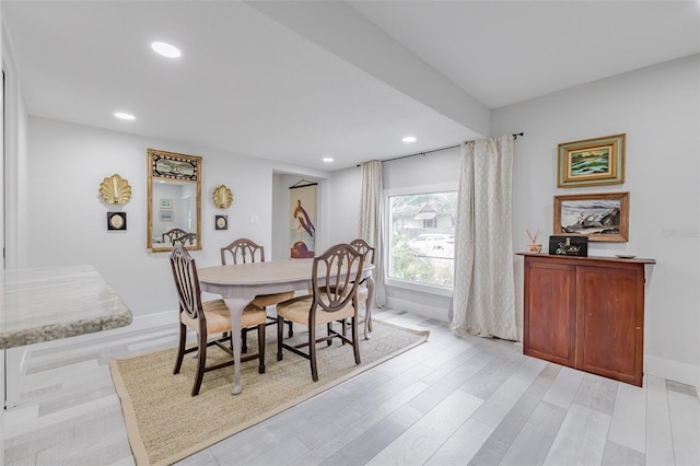 dining area with light hardwood / wood-style flooring