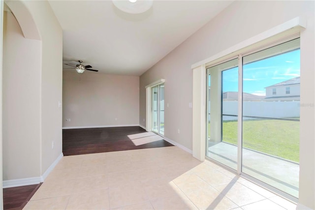 interior space featuring ceiling fan