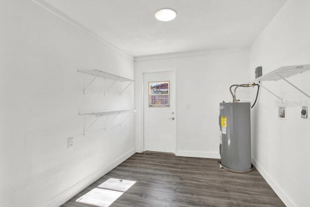 utility room featuring electric water heater