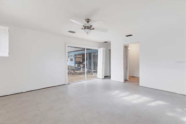 unfurnished room with ceiling fan