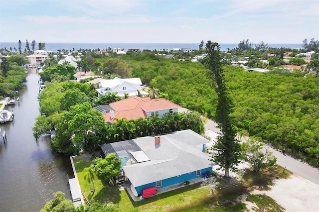 drone / aerial view with a water view