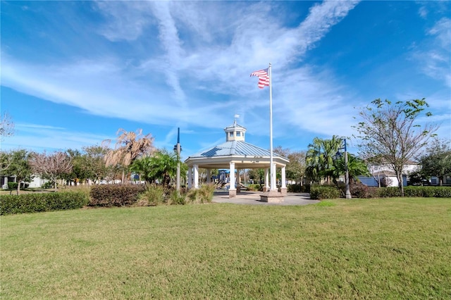 view of home's community with a gazebo and a lawn