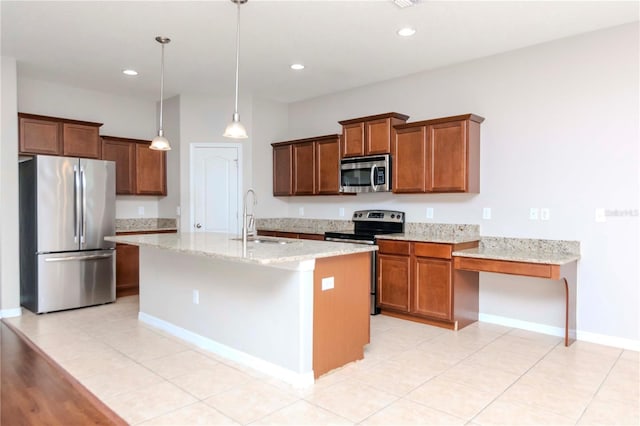 kitchen featuring light stone countertops, sink, stainless steel appliances, pendant lighting, and light tile patterned floors