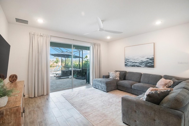 living room with ceiling fan