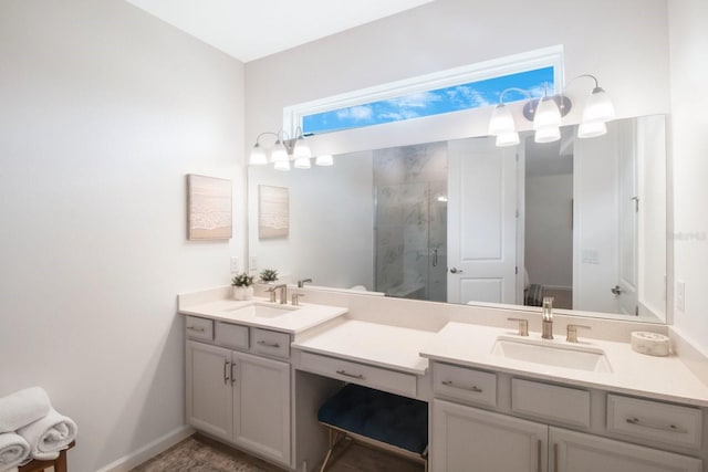 bathroom featuring vanity and an enclosed shower