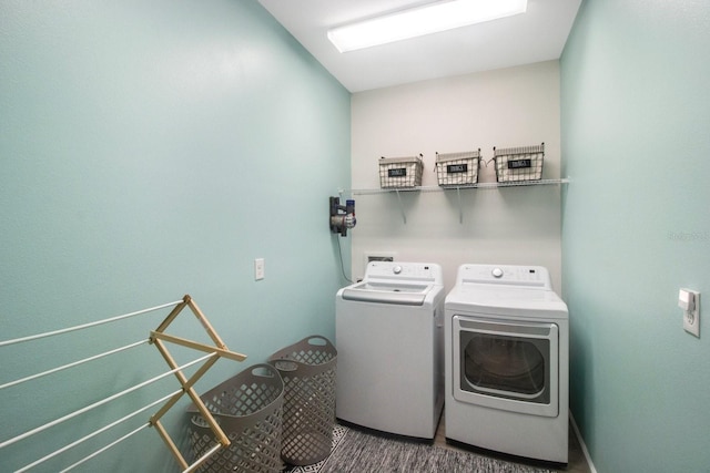 laundry area featuring washing machine and dryer