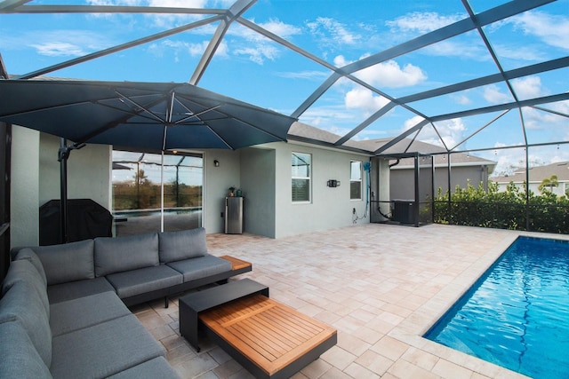 exterior space with glass enclosure, water heater, a patio, and an outdoor hangout area