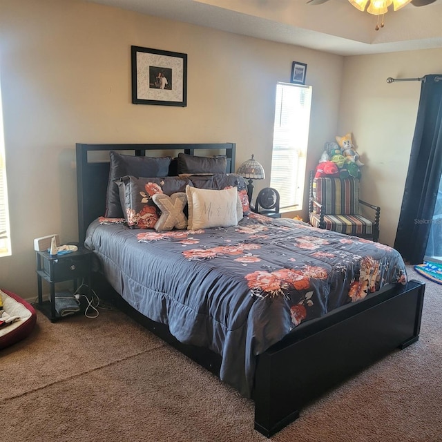 bedroom with carpet and ceiling fan