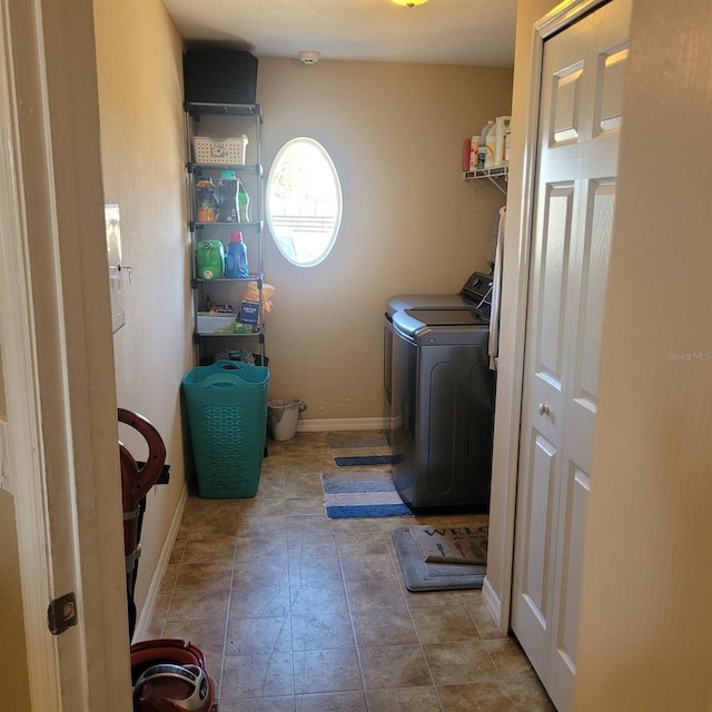 laundry area featuring independent washer and dryer