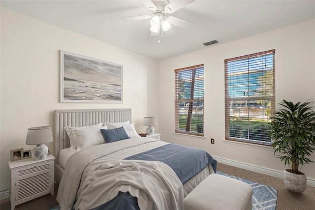 carpeted bedroom featuring ceiling fan