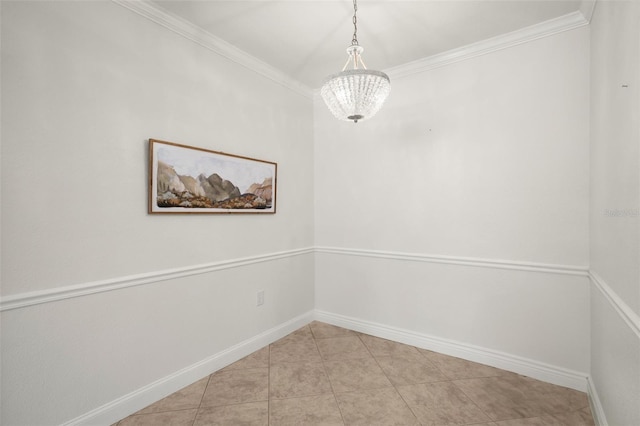 spare room featuring an inviting chandelier, crown molding, and light tile patterned flooring