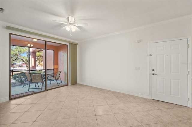 tiled empty room with ceiling fan and ornamental molding