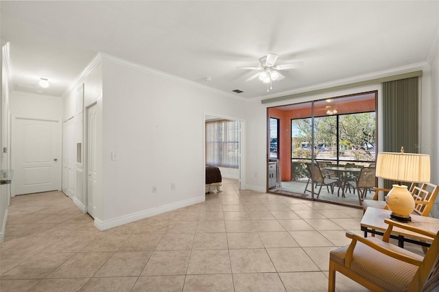 interior space featuring ceiling fan and crown molding