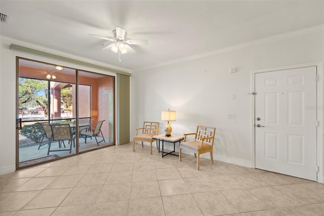 living area featuring light tile patterned floors, ceiling fan, and crown molding