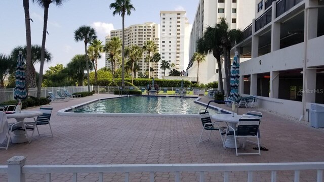 view of swimming pool featuring a patio