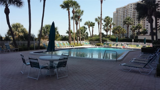 view of pool featuring a patio