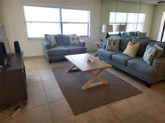 living room with light tile patterned floors