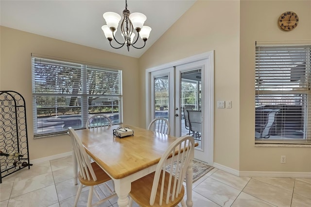 dining area featuring light tile patterned floors, lofted ceiling, and a notable chandelier