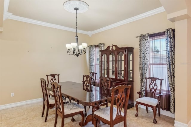 dining space with light tile patterned floors, an inviting chandelier, and ornamental molding