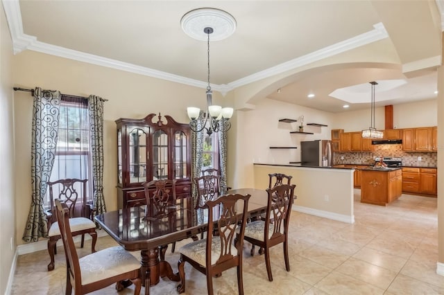 dining space with light tile patterned flooring, a notable chandelier, and ornamental molding