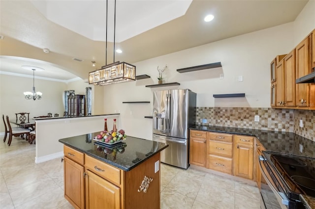 kitchen with pendant lighting, a center island, backsplash, black range with electric cooktop, and stainless steel fridge with ice dispenser