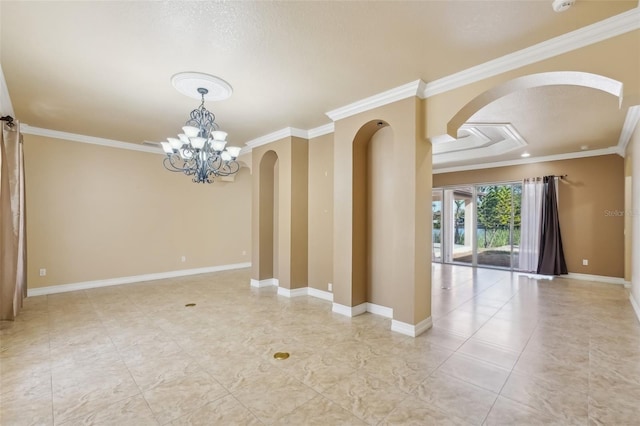 unfurnished room with a notable chandelier and ornamental molding