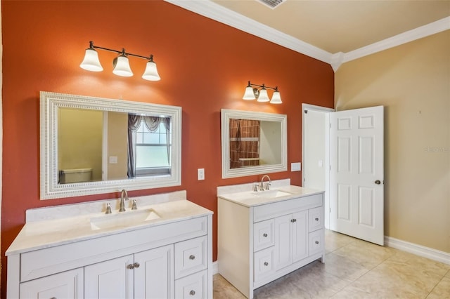 bathroom with toilet, vanity, tile patterned floors, and crown molding