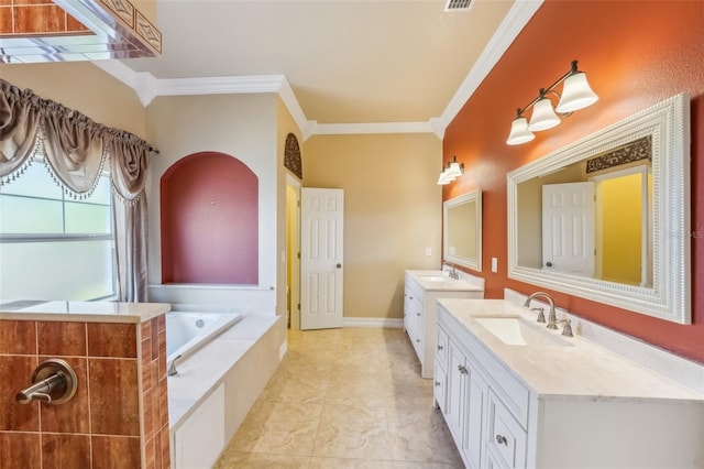 bathroom with vanity, ornamental molding, and tiled tub