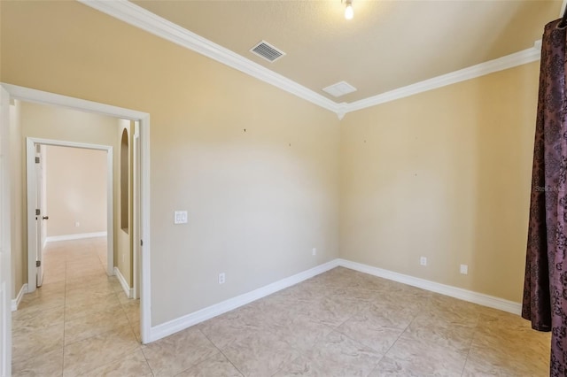 unfurnished room with light tile patterned floors and crown molding