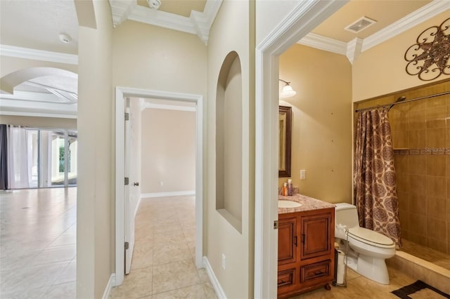 bathroom with a shower with shower curtain, vanity, crown molding, and tile patterned floors