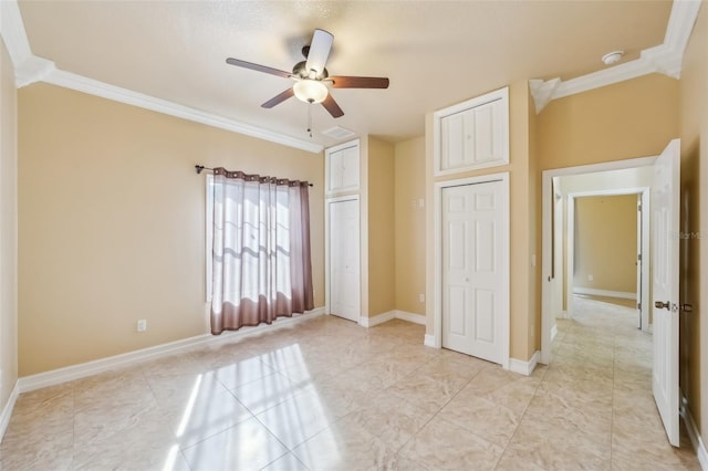 unfurnished bedroom with ceiling fan and ornamental molding