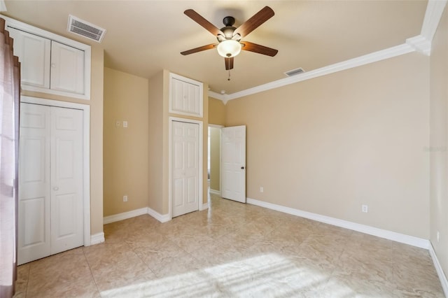 unfurnished bedroom with ceiling fan and ornamental molding