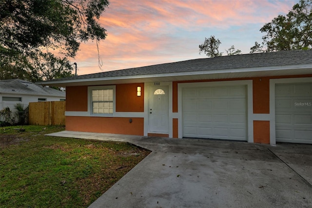 ranch-style house with a garage