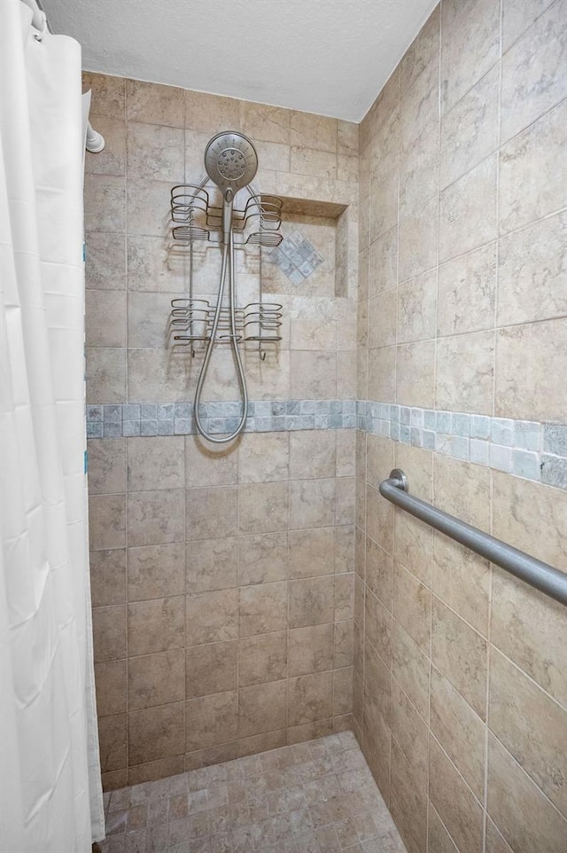 bathroom featuring a shower with curtain