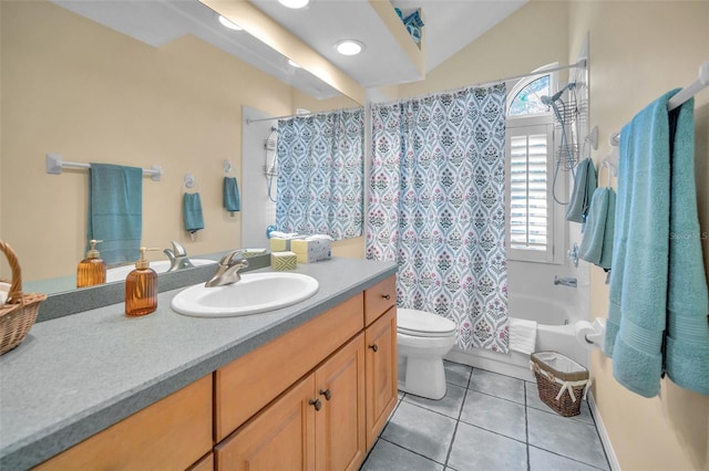 full bathroom featuring vanity, lofted ceiling, tile patterned floors, shower / bath combination with curtain, and toilet