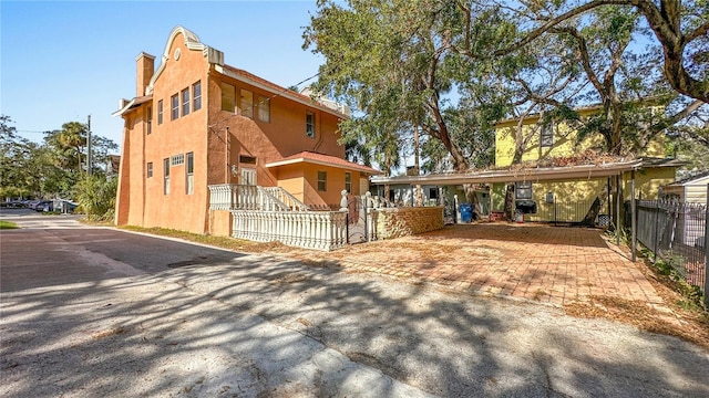 view of front facade featuring a carport