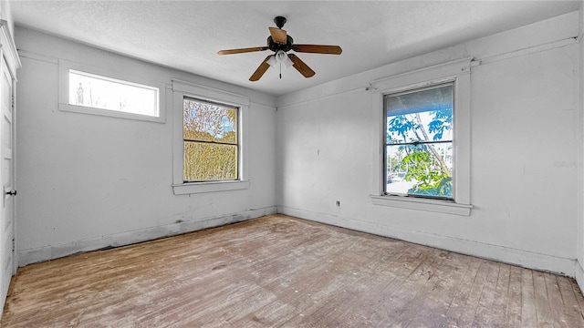 spare room with ceiling fan