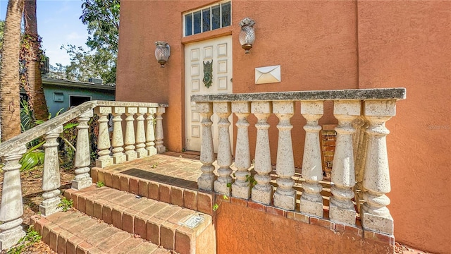 entrance to property with covered porch