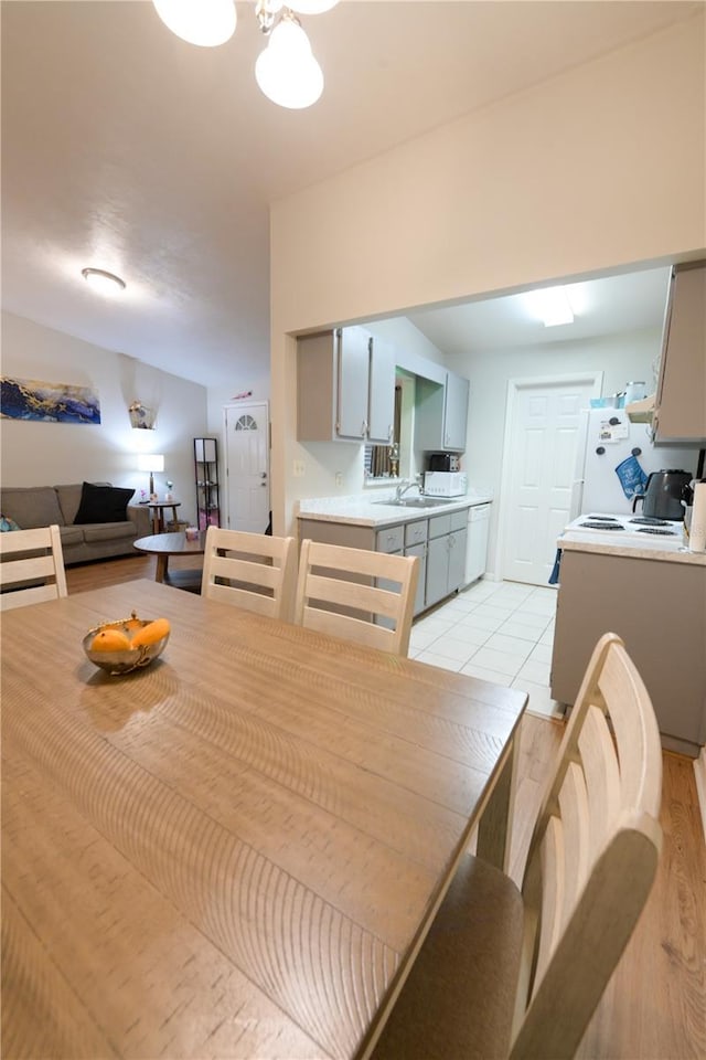 dining space with light tile patterned floors